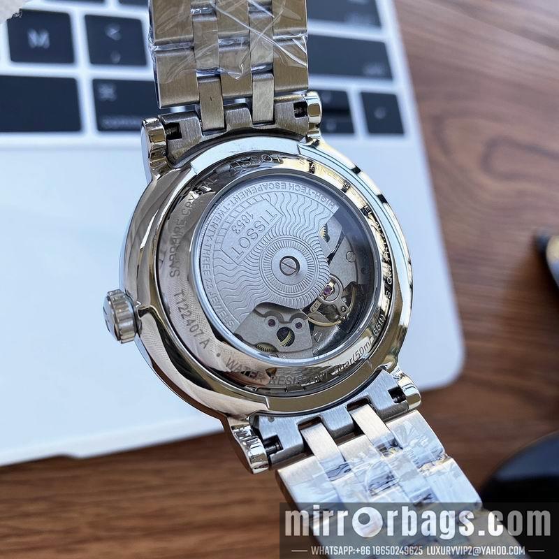 Tissot 40mm 32mm 091006
