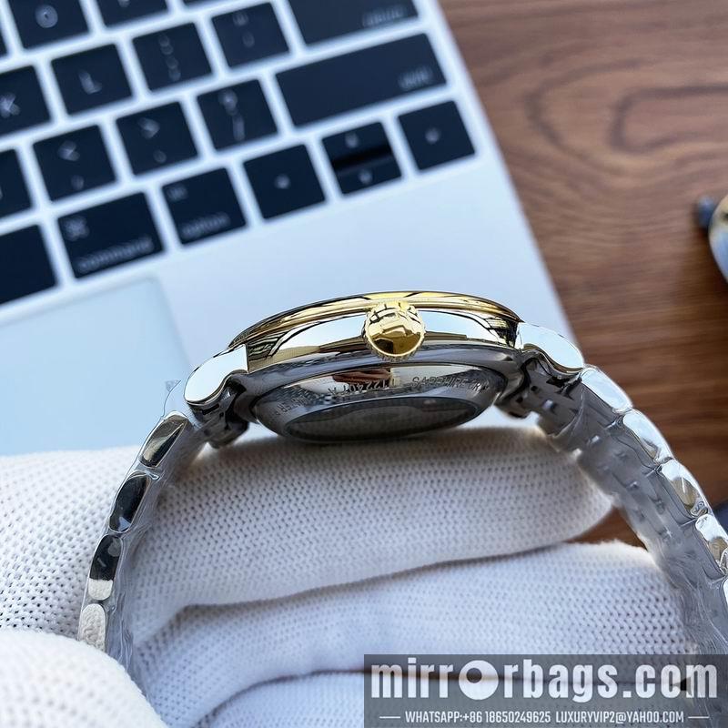 Tissot 40mm 32mm 091006