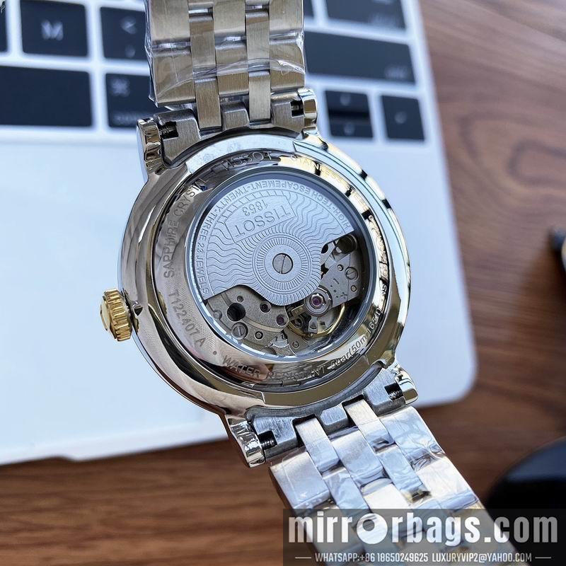 Tissot 40mm 32mm 091006